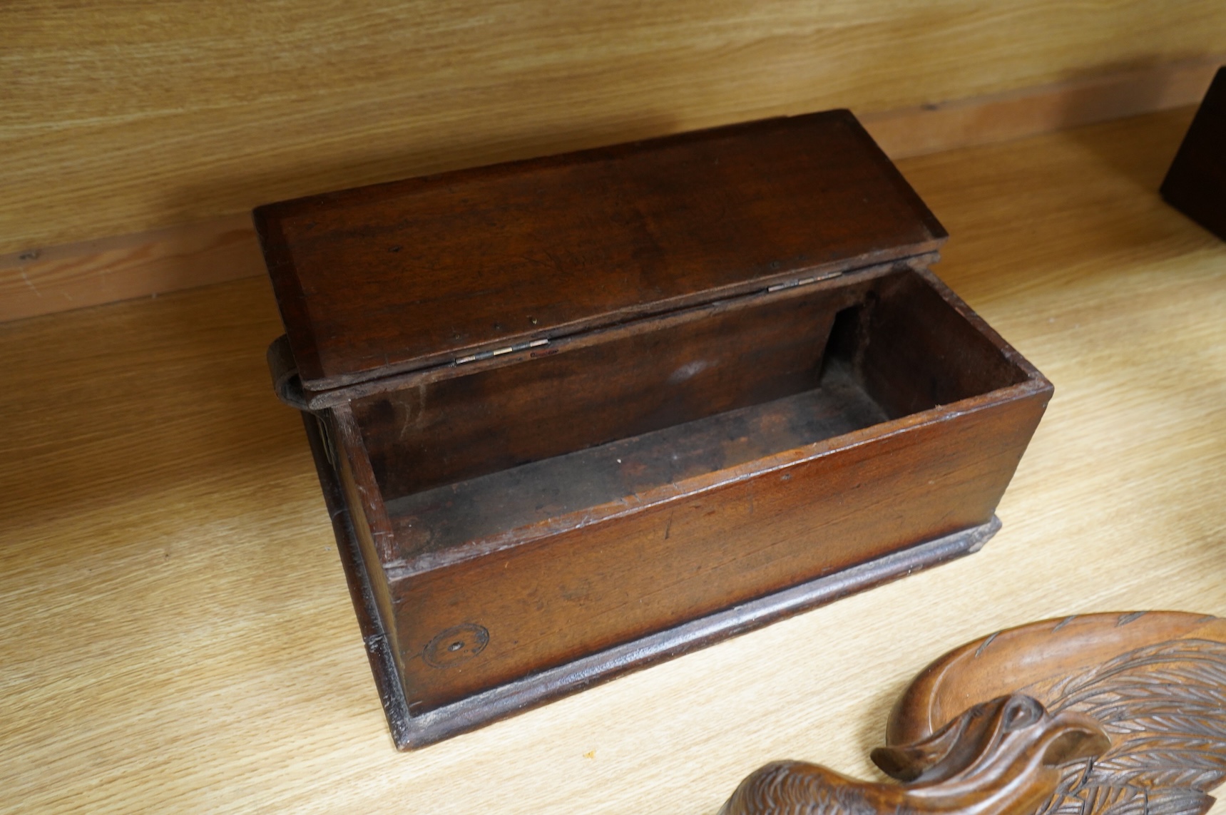 A mahogany leather-handled tool box and carved American eagle wall mount, largest 66cm wide